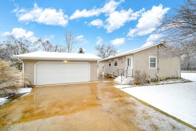 ranch-style home with a garage