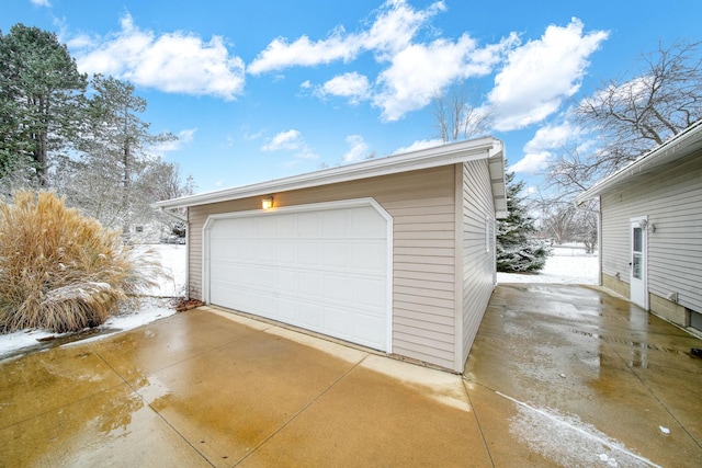 view of snow covered garage