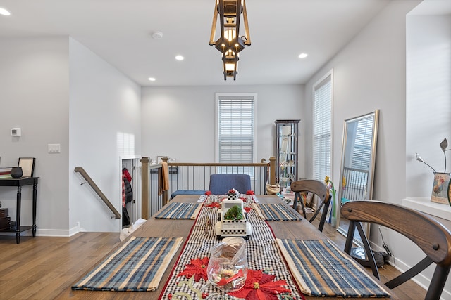 dining area with hardwood / wood-style flooring