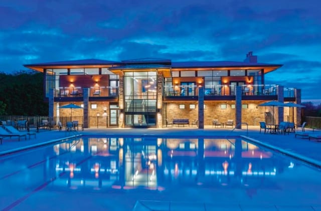 view of pool featuring a patio