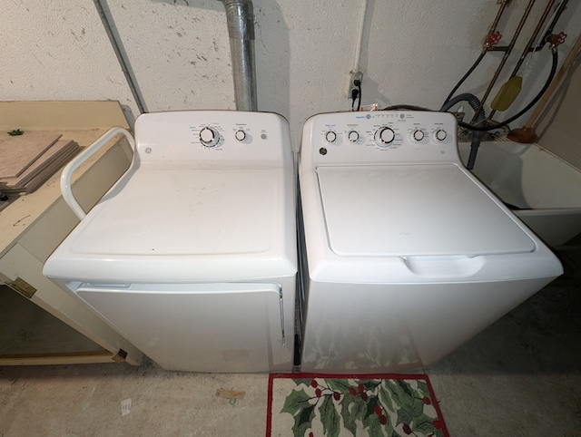 laundry area featuring washing machine and dryer