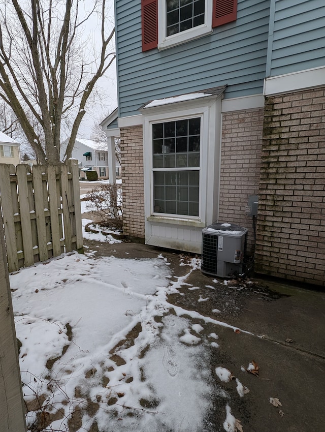 exterior space featuring central air condition unit