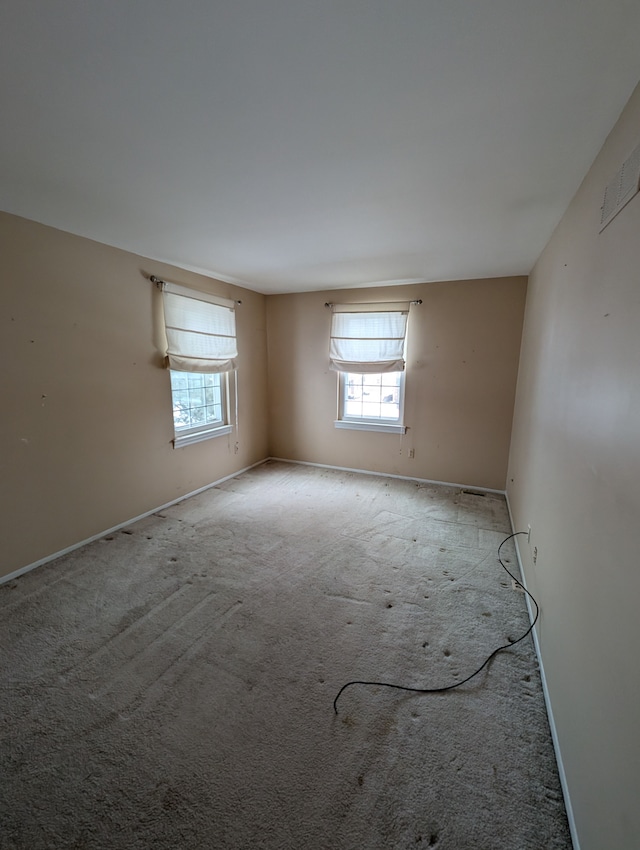 view of carpeted spare room