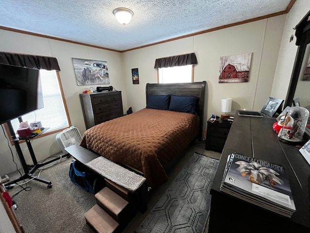 carpeted bedroom featuring a textured ceiling and crown molding