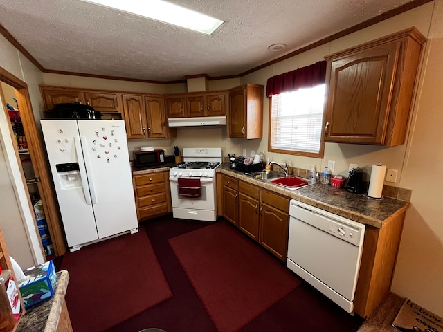 kitchen featuring a textured ceiling, sink, white appliances, and ornamental molding