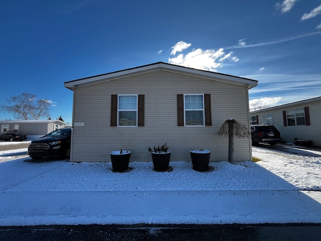 view of snow covered property