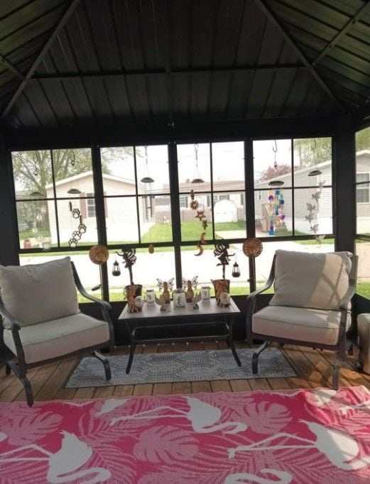 sunroom featuring a wealth of natural light