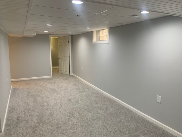 basement with carpet flooring