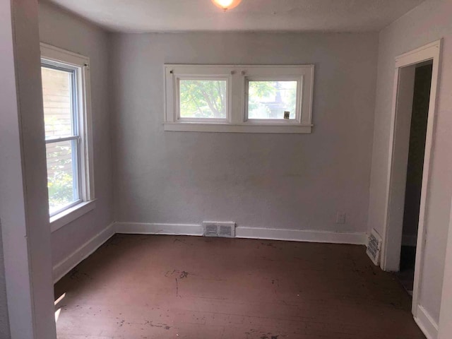 spare room with plenty of natural light