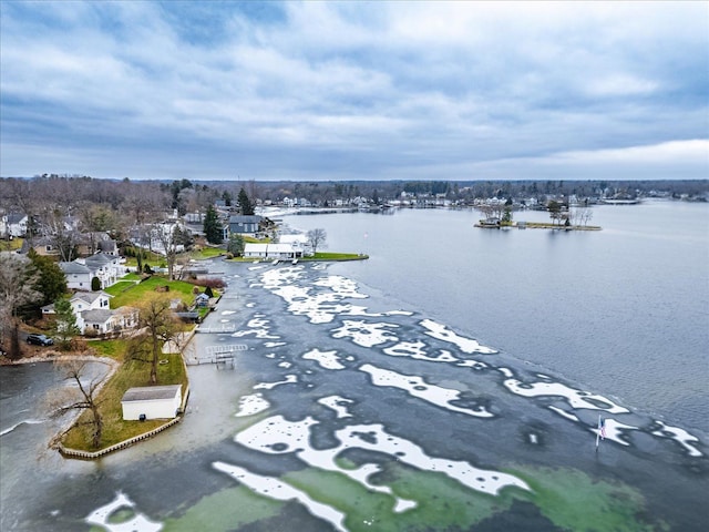 bird's eye view with a water view