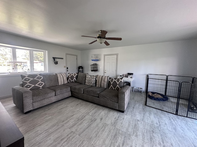 living room with ceiling fan