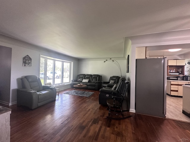 living room with dark hardwood / wood-style floors