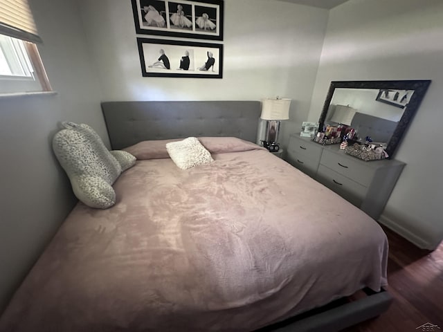 bedroom featuring hardwood / wood-style floors