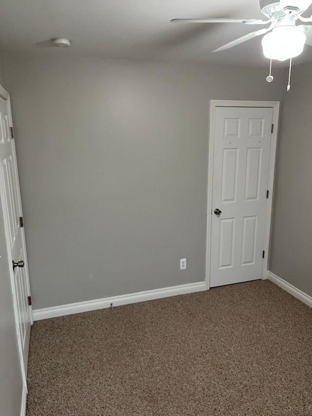 unfurnished room featuring ceiling fan