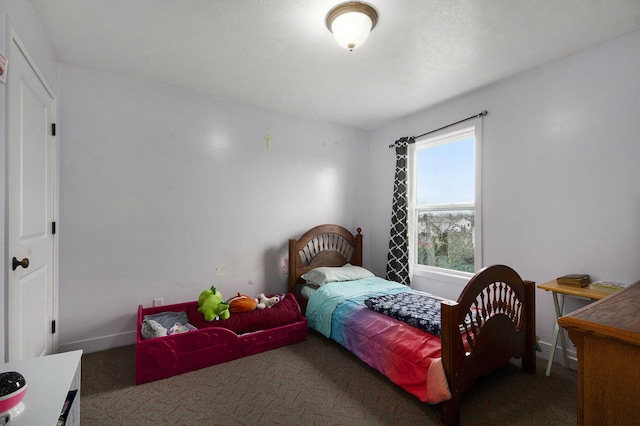 bedroom featuring carpet