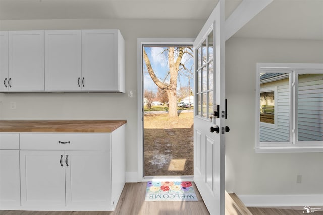 doorway to outside with light hardwood / wood-style flooring