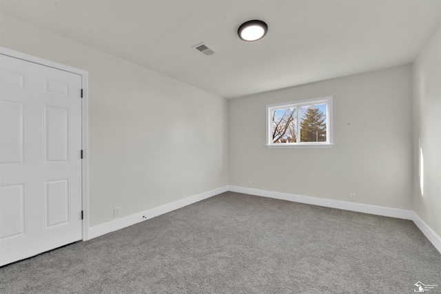 unfurnished room with carpet floors