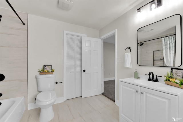 full bathroom with shower / tub combo, vanity, and toilet