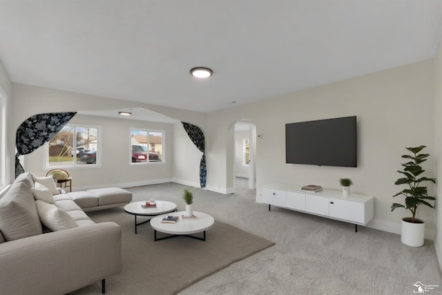 living room with light colored carpet