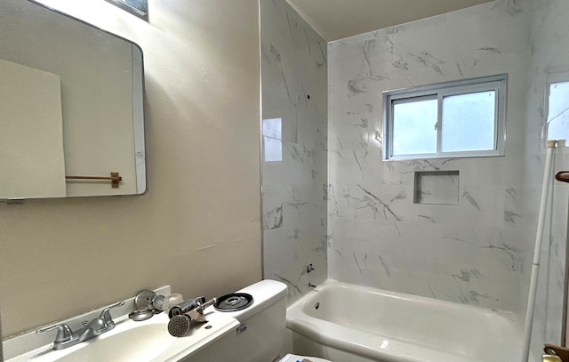 full bathroom with toilet, tub / shower combination, and sink