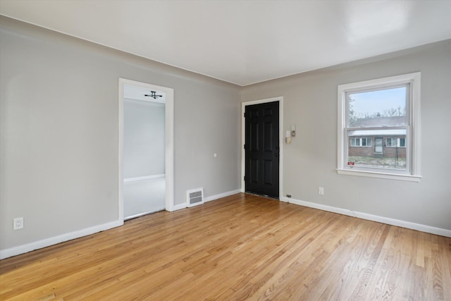 empty room featuring light hardwood / wood-style floors