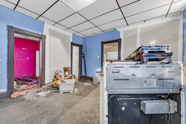 miscellaneous room with a paneled ceiling