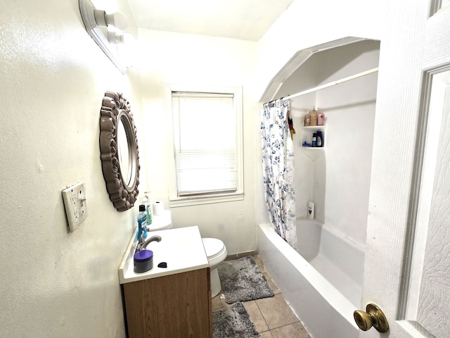 full bathroom featuring tile patterned flooring, vanity, shower / bath combo, and toilet