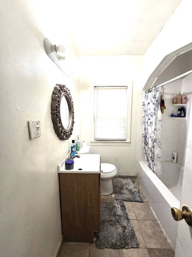 full bathroom with shower / bath combo, vanity, and toilet