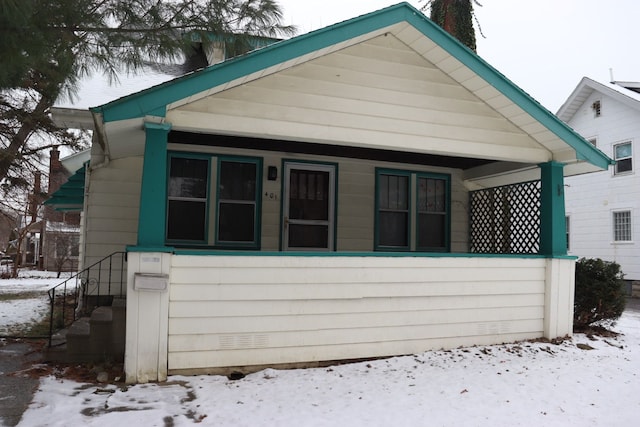 bungalow-style house featuring covered porch