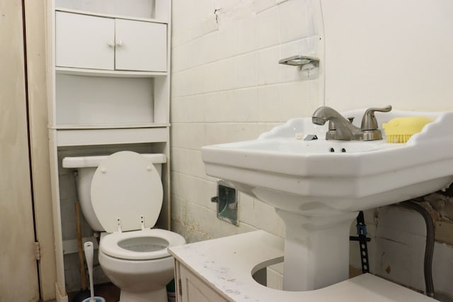 bathroom with toilet and sink