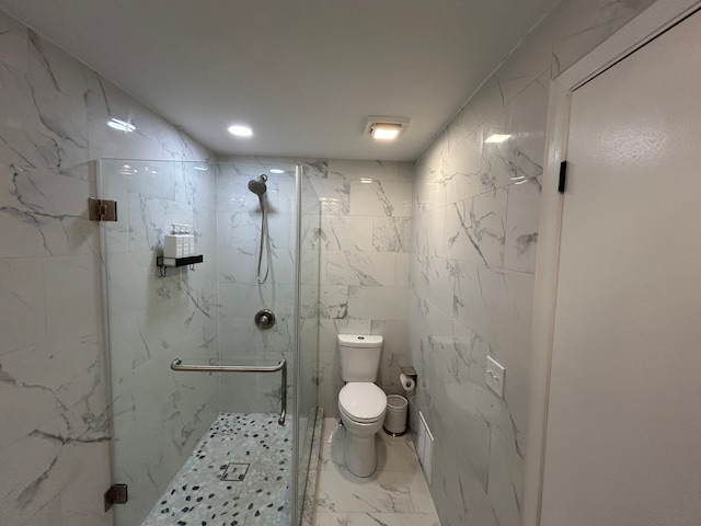 bathroom with toilet and walk in shower