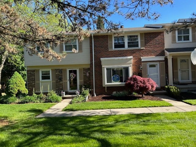 1622 Brentwood Dr, Troy, MI 48098 - multi unit property with a front lawn and brick siding