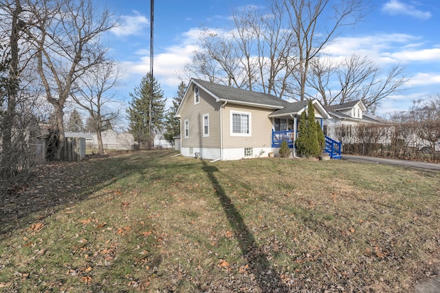 exterior space with a porch and a yard