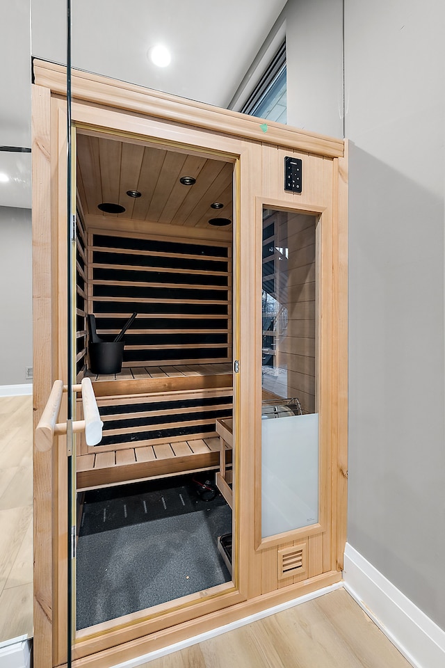 view of sauna / steam room with hardwood / wood-style floors