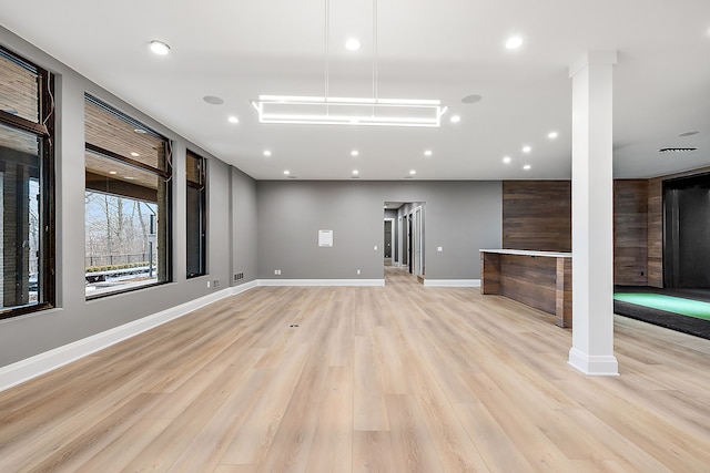 basement featuring light wood-type flooring