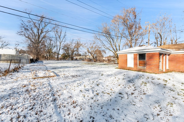 view of snowy yard