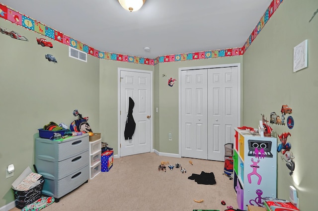 rec room featuring baseboards, carpet flooring, and visible vents
