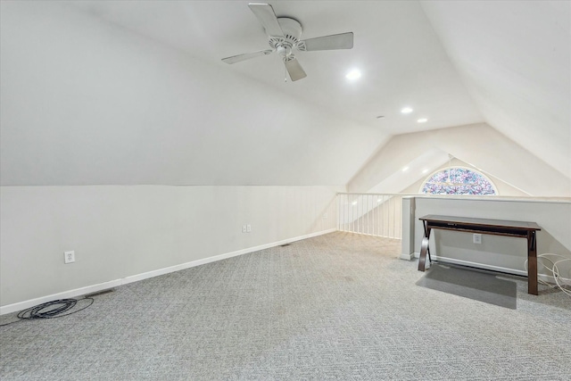 additional living space with carpet, baseboards, vaulted ceiling, and recessed lighting