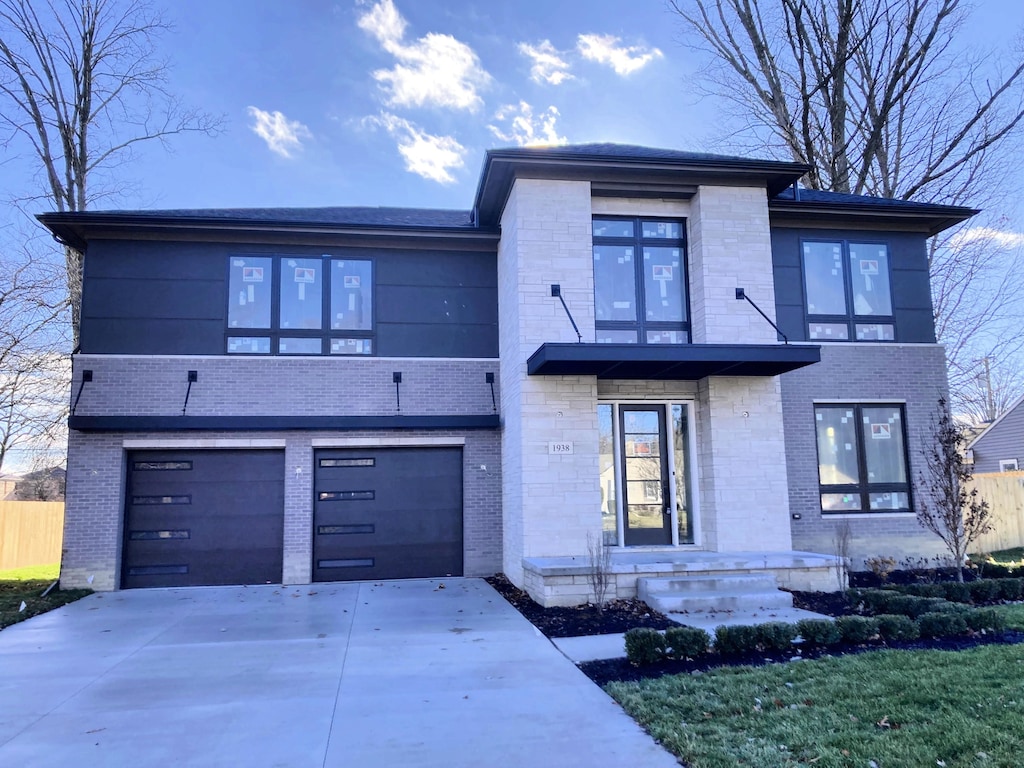 view of front of property featuring a garage