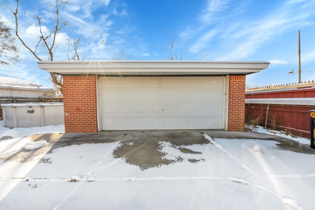 view of snow covered garage