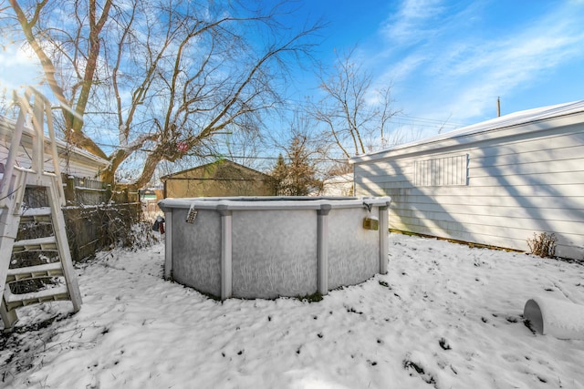 view of yard covered in snow