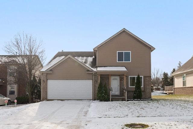 front of property with a garage