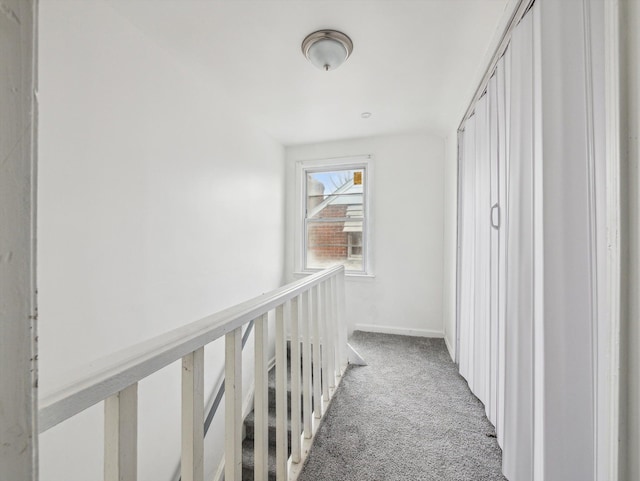 corridor with carpet flooring