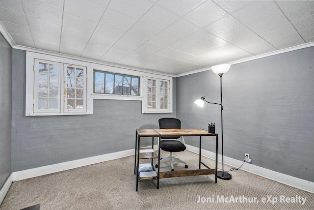 carpeted office with baseboards and ornamental molding