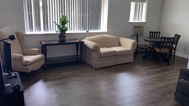 living room with hardwood / wood-style floors and cooling unit