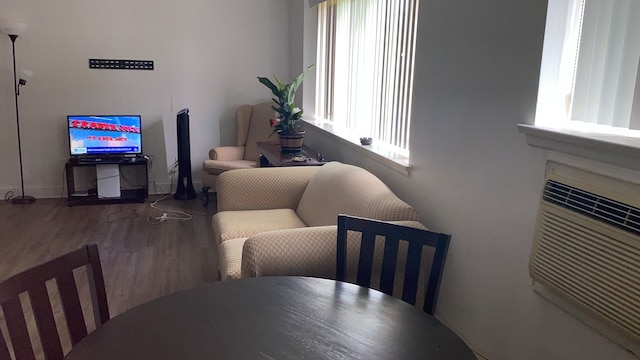 dining space featuring hardwood / wood-style floors