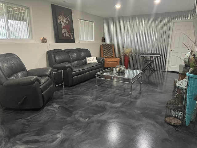 living room featuring concrete flooring