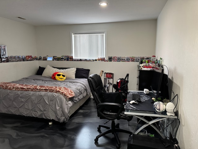 bedroom with concrete floors