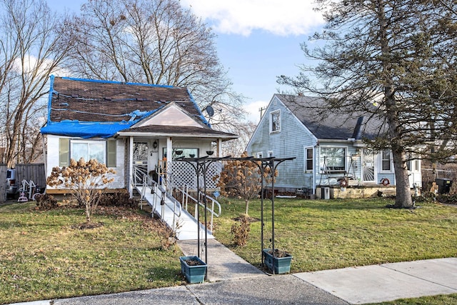 bungalow with a front lawn