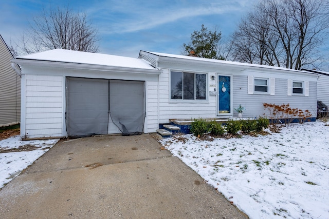 single story home featuring a garage